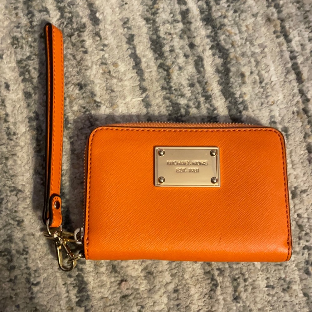 Leather Michael Kors orange wallet